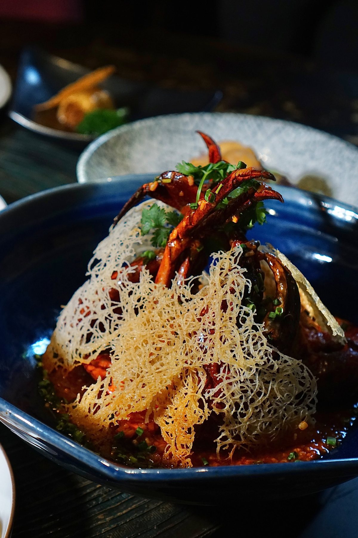 Chef at work inside Mott 32 Bangkok